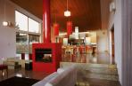 Massive fireplace by Warmington is a focal point.