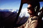 Akira Matshushita pilots his Robinson R44 towards Maruia Springs.